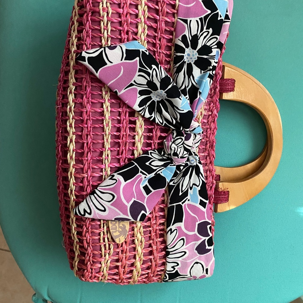 Vintage Straw and cloth purse with wooden handles. Excellent condition. 12” x 6”